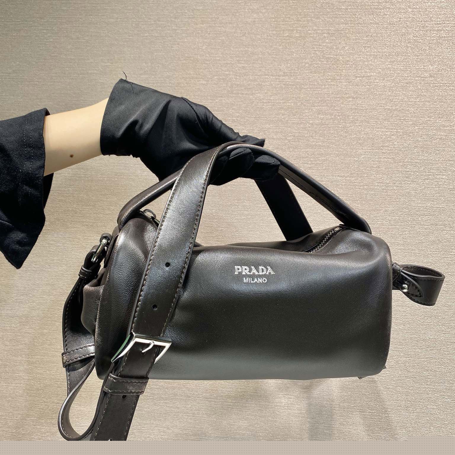 Pra*a top handle bags